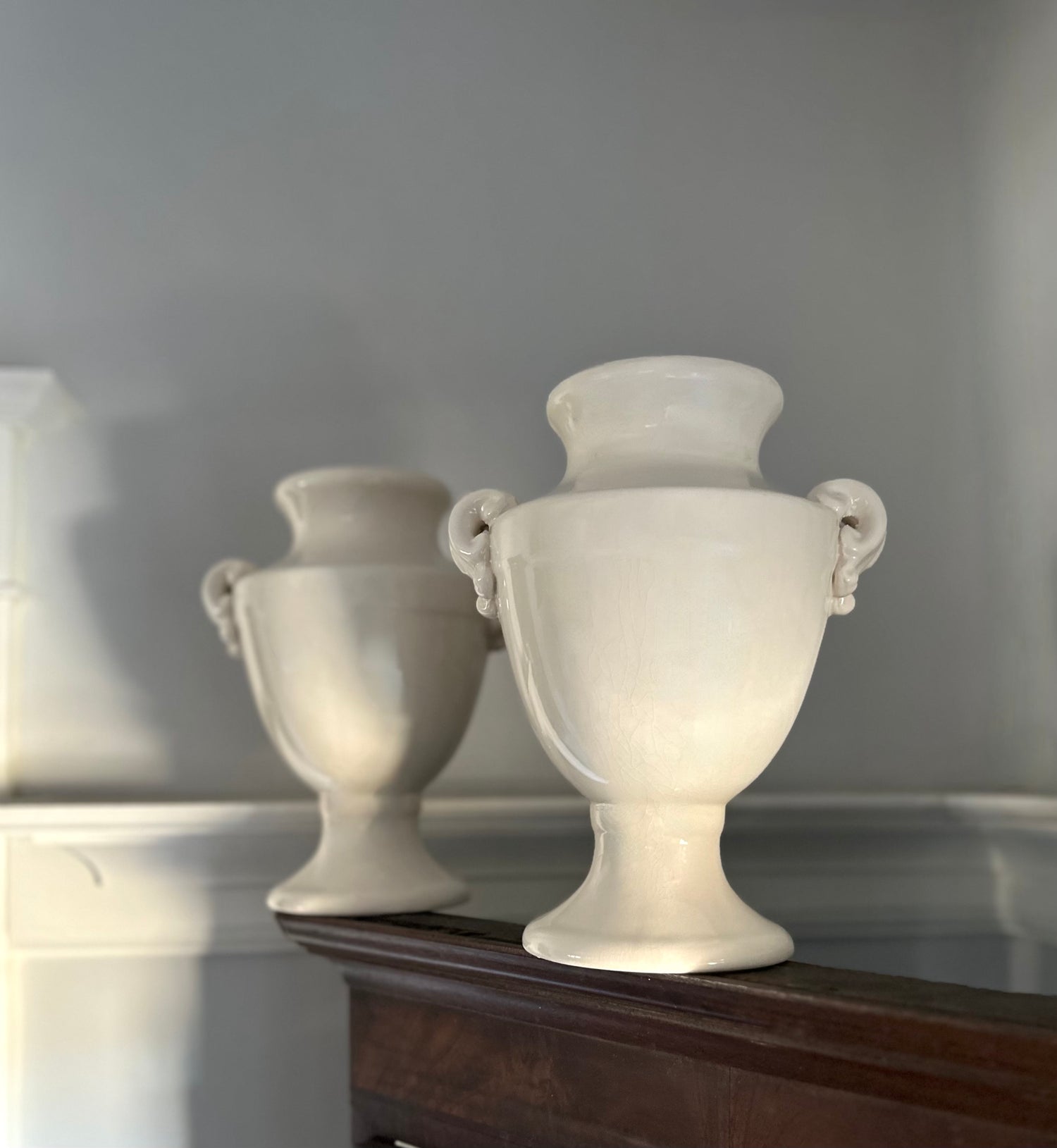Pair Cream Urns