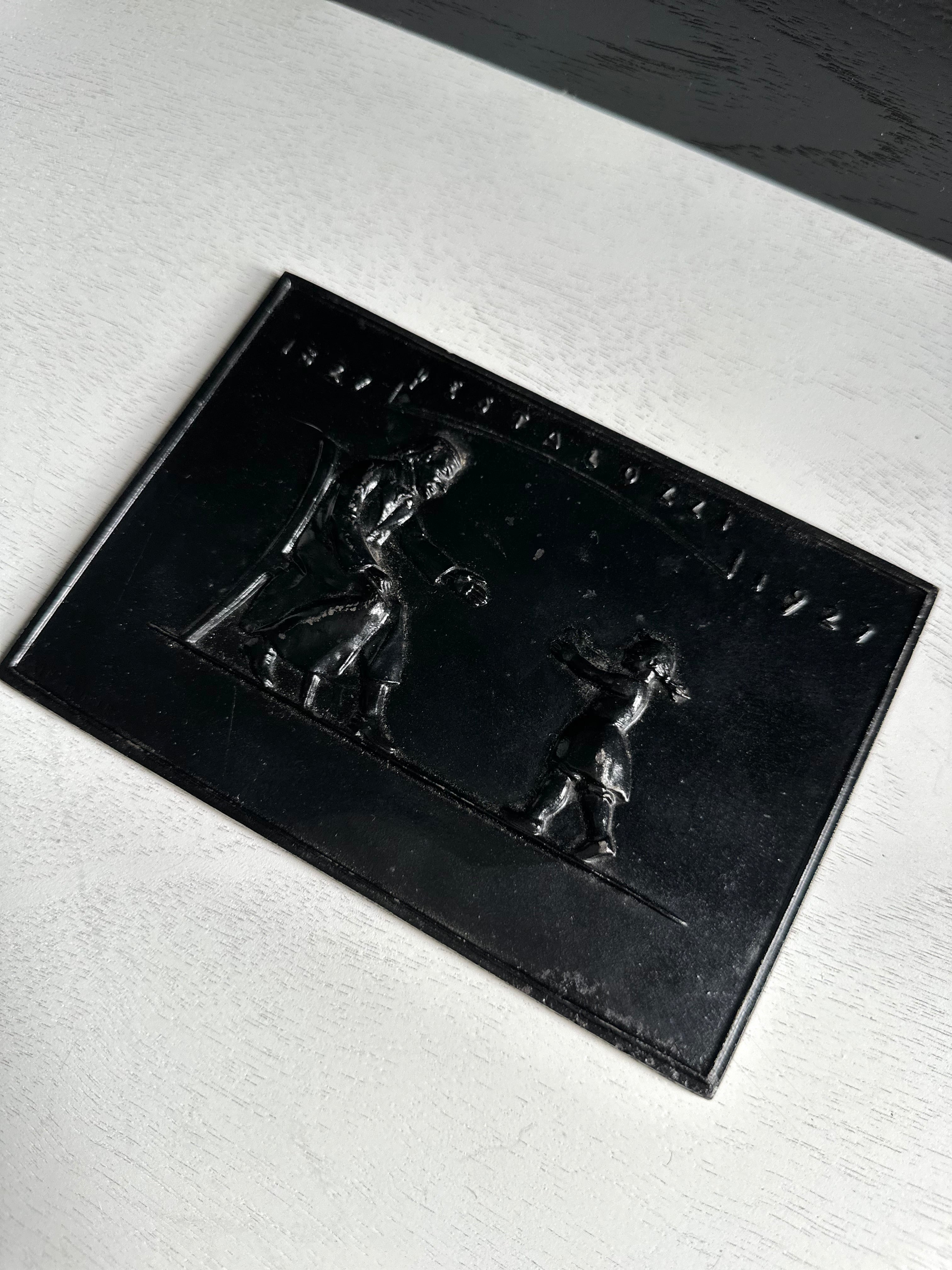 Antique Black Plaque