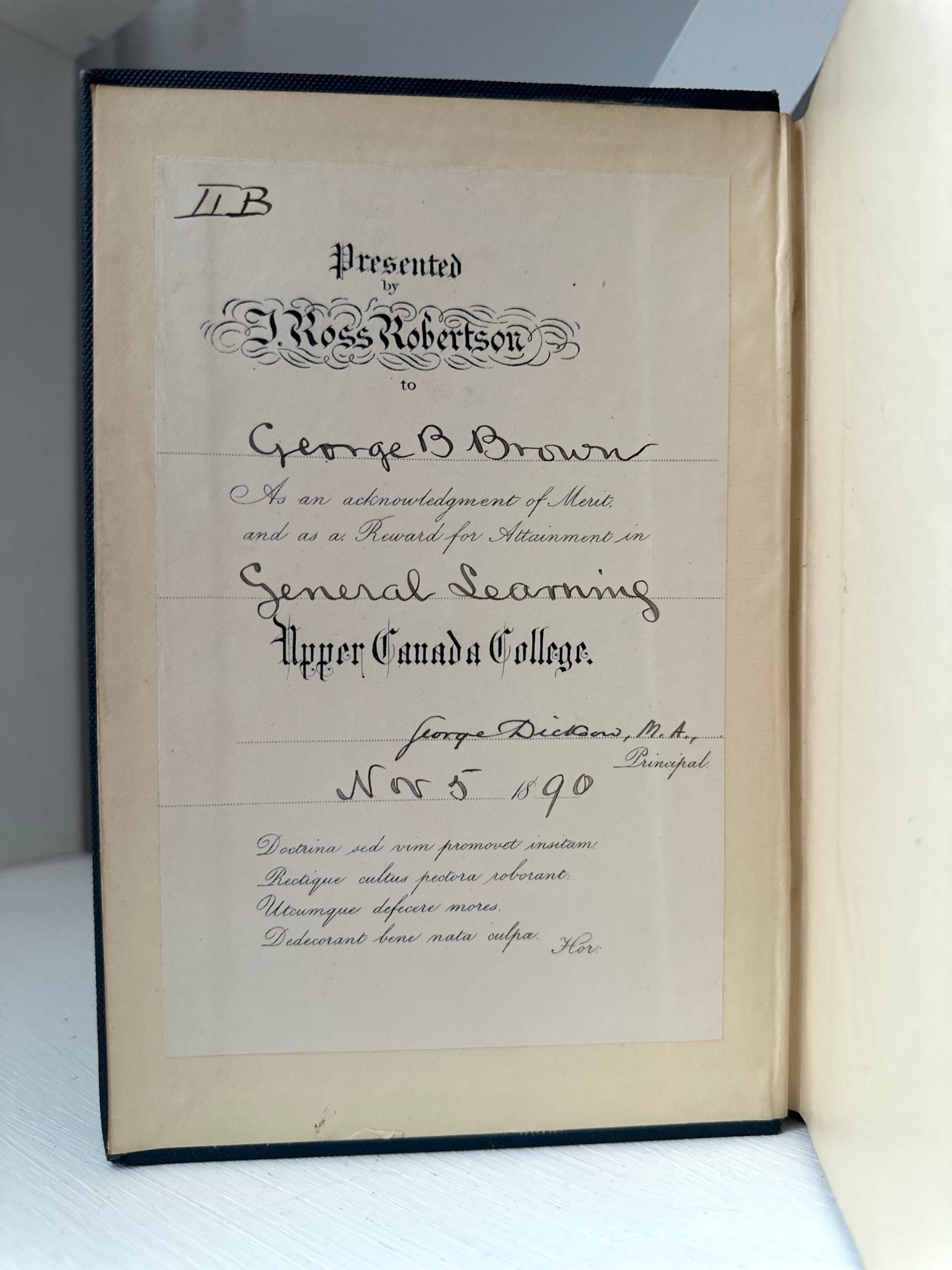 Old document with text and a signature, framed against a white background