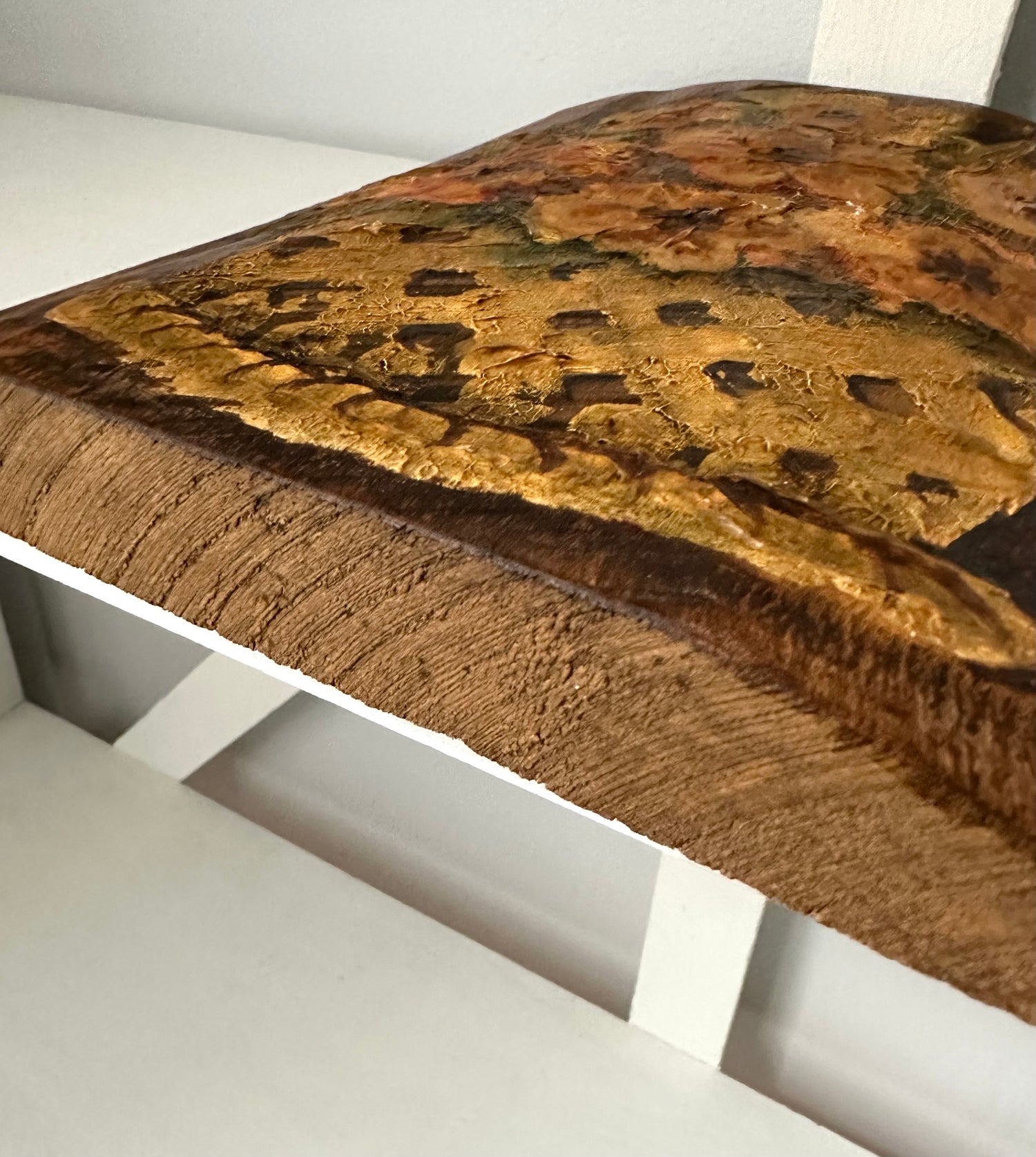 Wooden table with a burl pattern on a white background