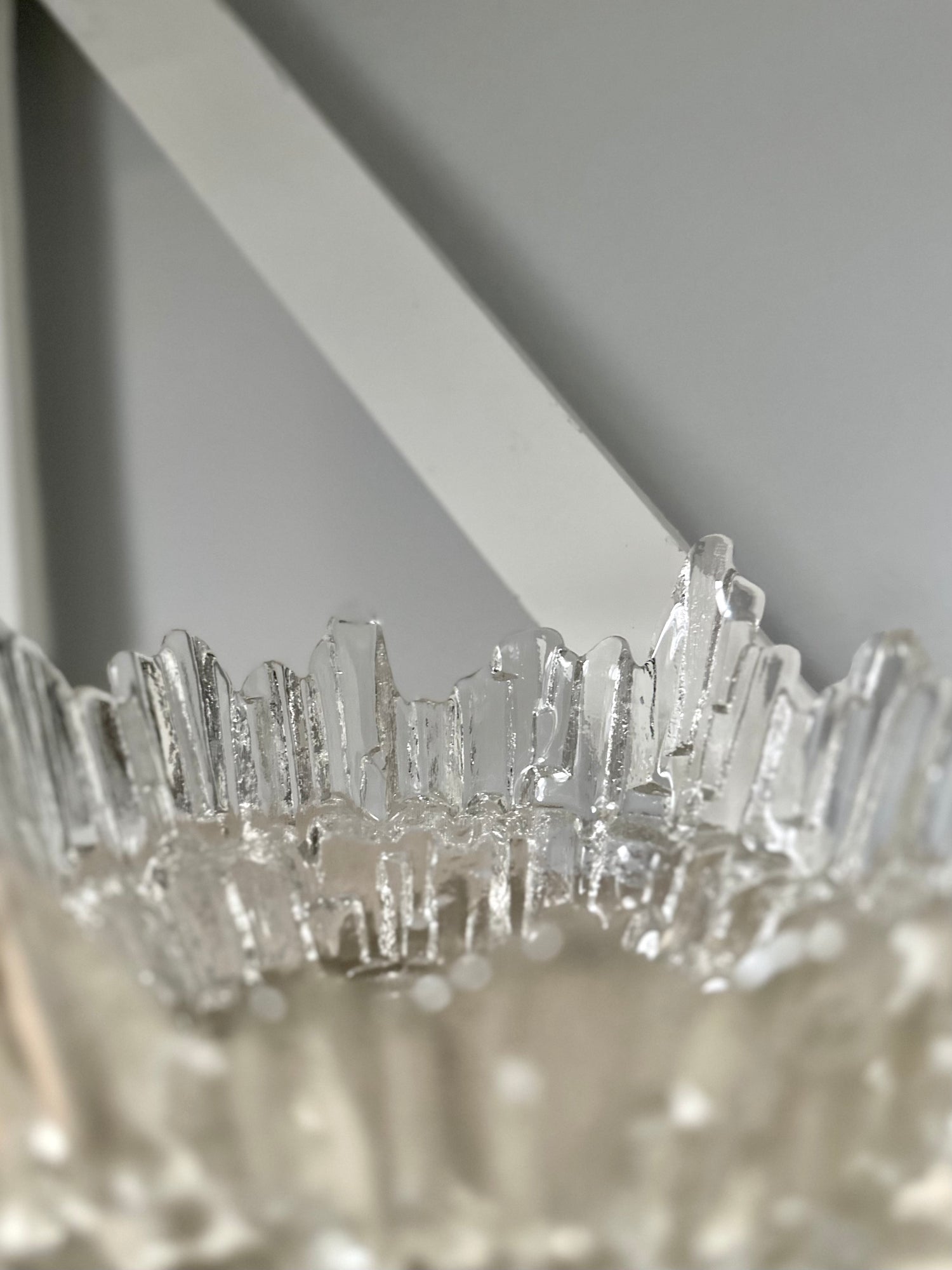 Textured glass bowl with a light background