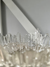 Textured glass bowl with a light background