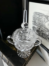 Glass Bowl on Books with Black and White Print