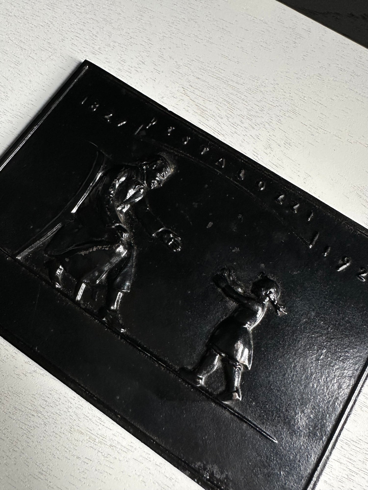 Antique Black Plaque