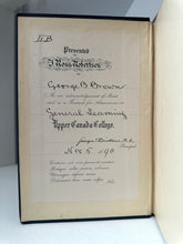 Old document with text and a signature, framed against a white background