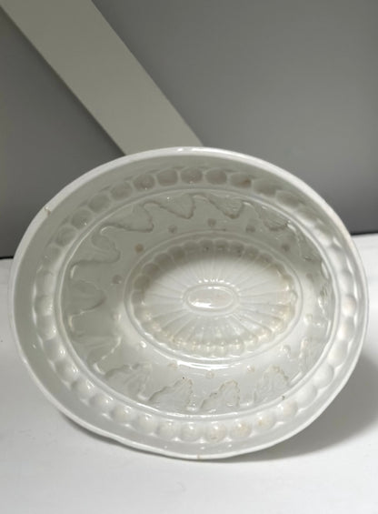 Clear plastic lid with textured surface on a white background