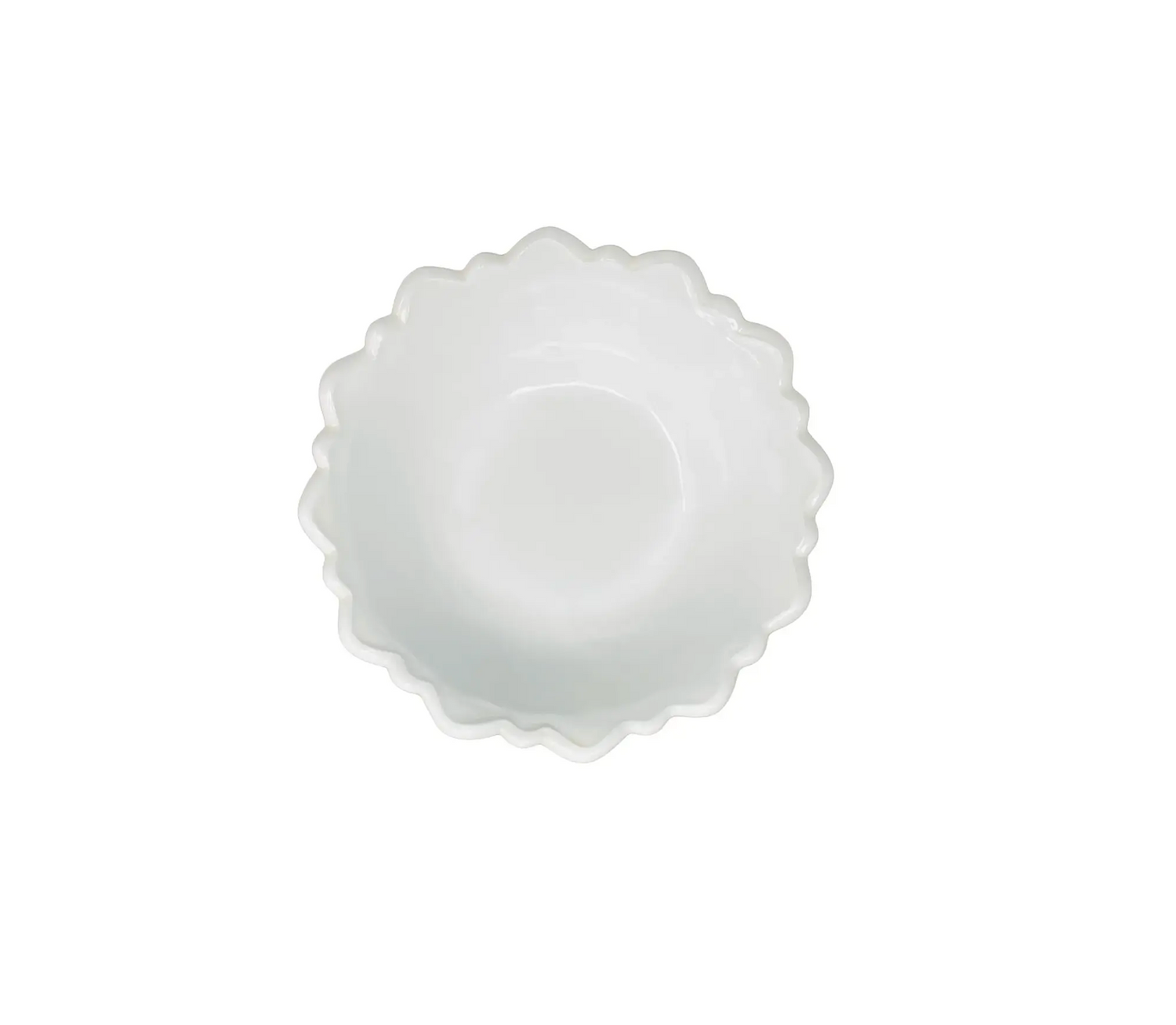 White scalloped-edge bowl on a white background