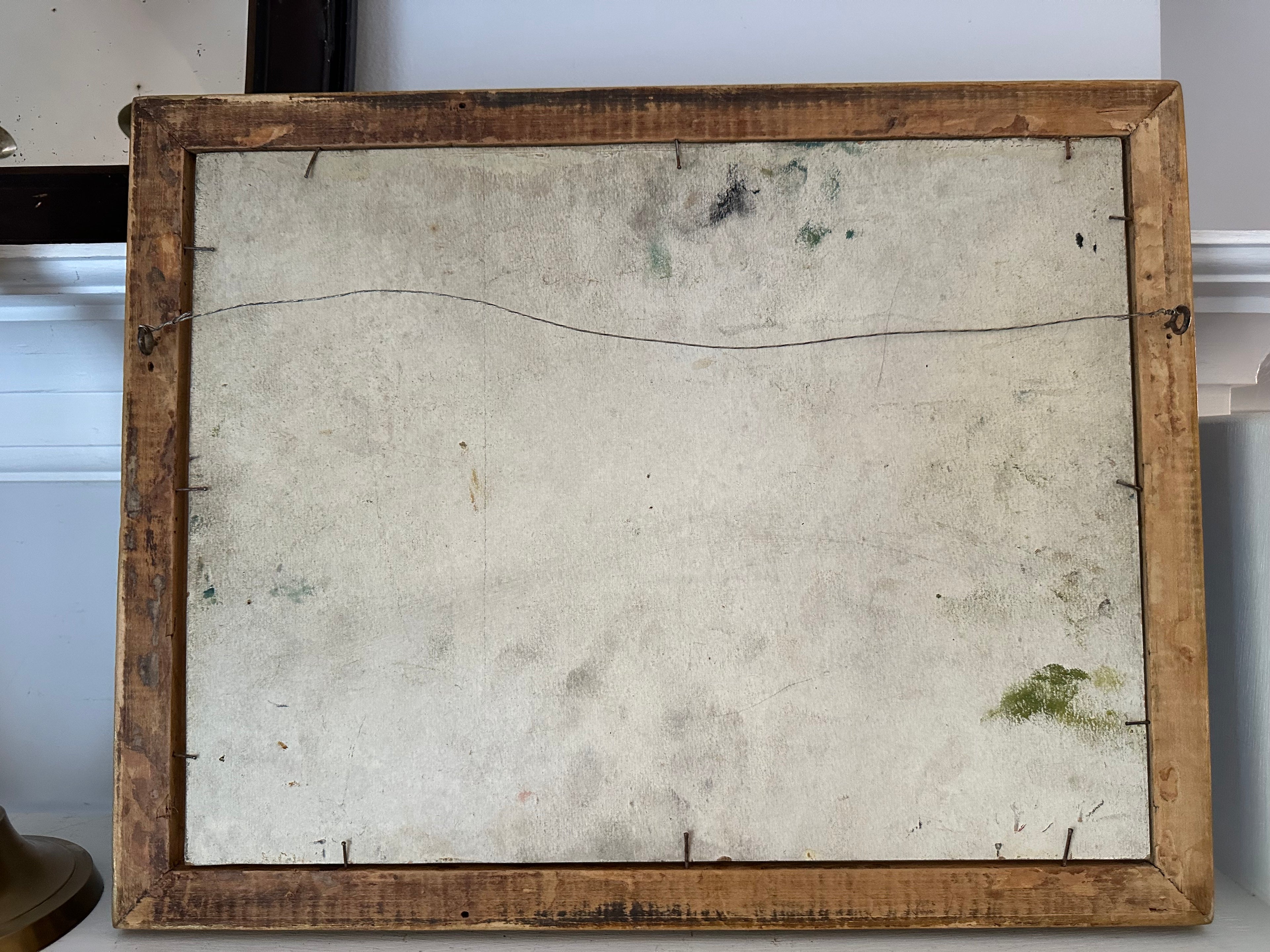 Vintage wooden picture frame with a white backer
